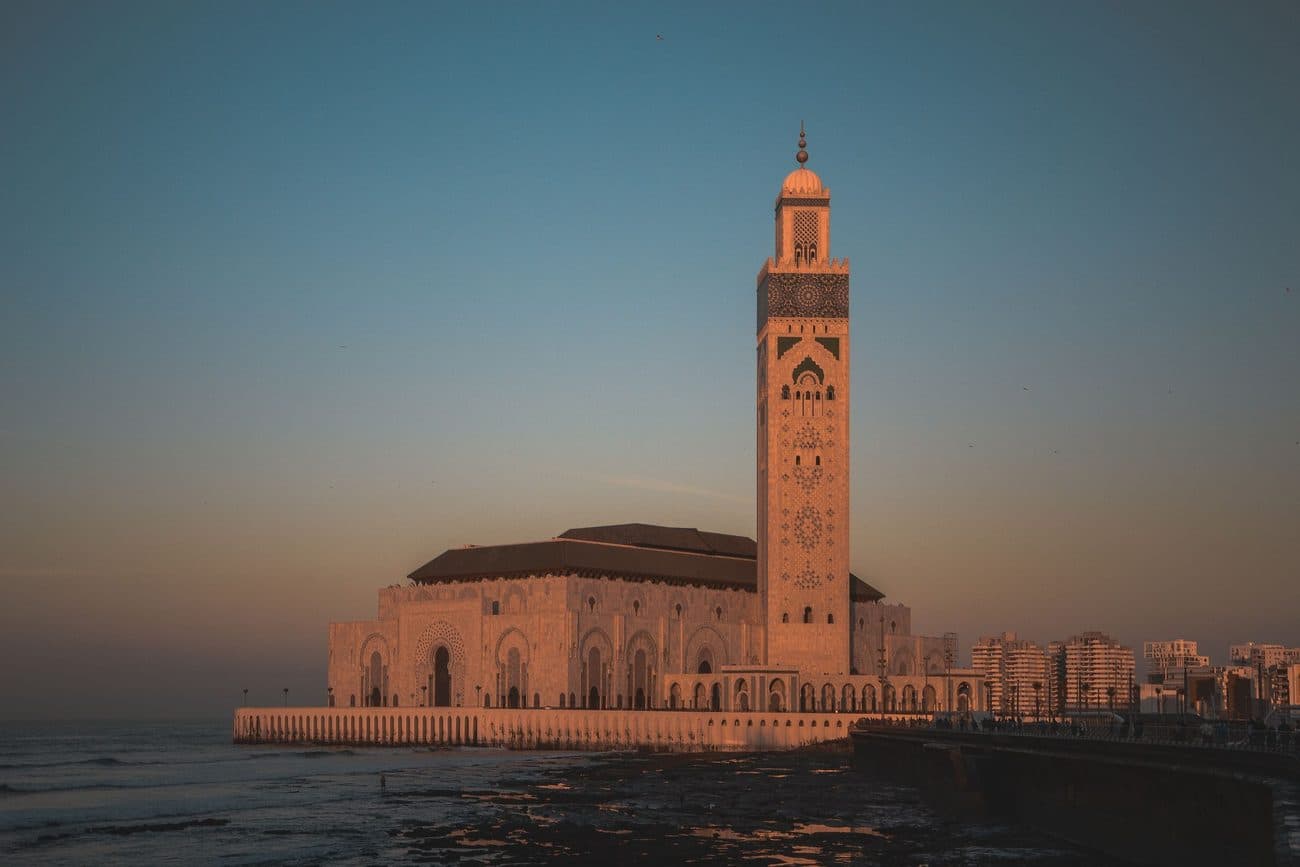 The Hassan II Mosque in Casablanca on the Atlantic shore in late-afternoon light