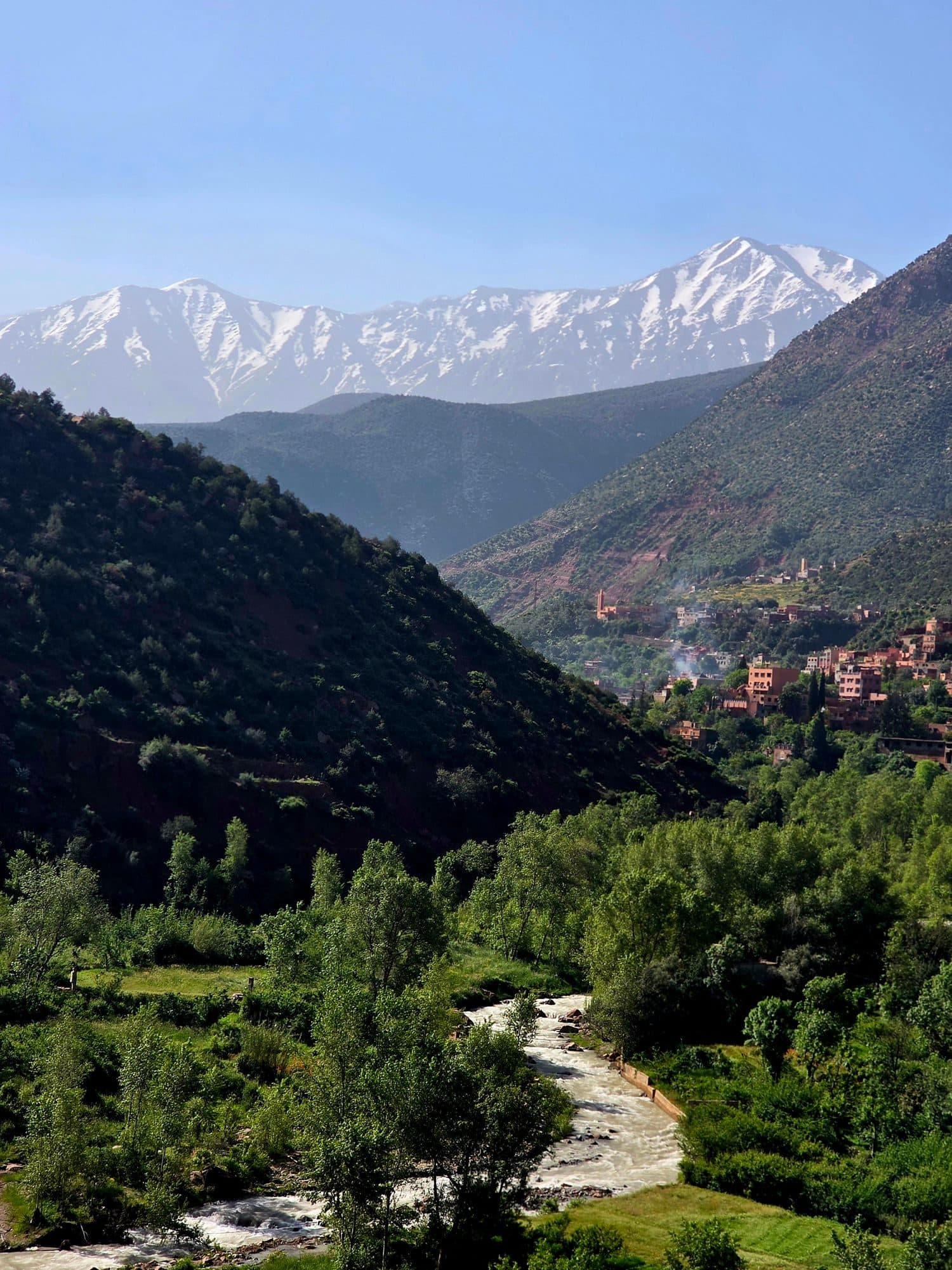 The green Ourika valley before the snow-capped Atlas peaks